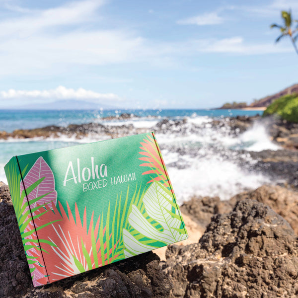 Aloha Boxed box sitting by Maui ocean